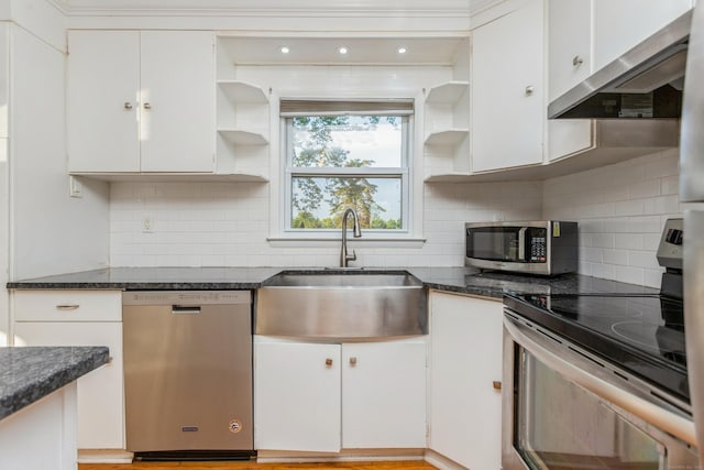 20 Karen Rd, Danbury, CT 06811 - kitchen with appliances with stainless steel finishes, open shelves, exhaust hood, and white cabinetry