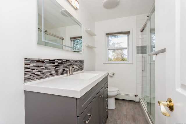 20 Karen Rd, Danbury, CT 06811 - bathroom with vanity, wood finished floors, a shower stall, and a baseboard radiator