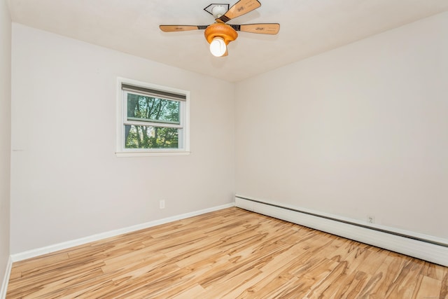 20 Karen Rd, Danbury, CT 06811 - unfurnished room with a baseboard heating unit, wood finished floors, and a ceiling fan
