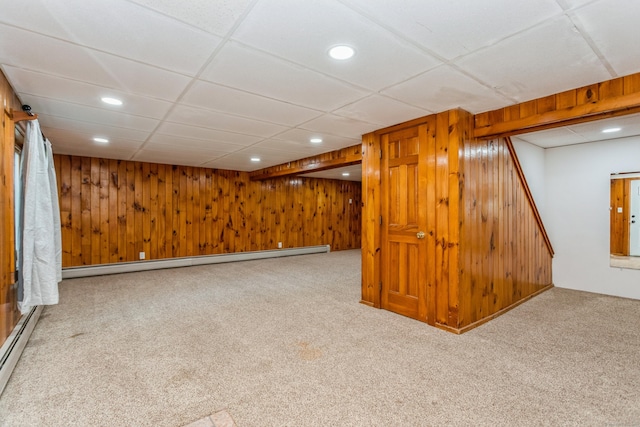 20 Karen Rd, Danbury, CT 06811 - finished below grade area featuring carpet, a baseboard heating unit, wooden walls, recessed lighting, and a paneled ceiling