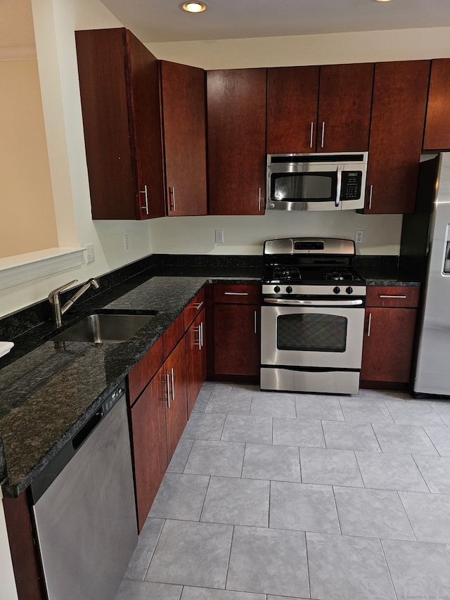 17 Marble Faun Ln Unit 17, Windsor, CT 06095 - kitchen featuring appliances with stainless steel finishes, a sink, recessed lighting, dark stone countertops, and light tile patterned floors
