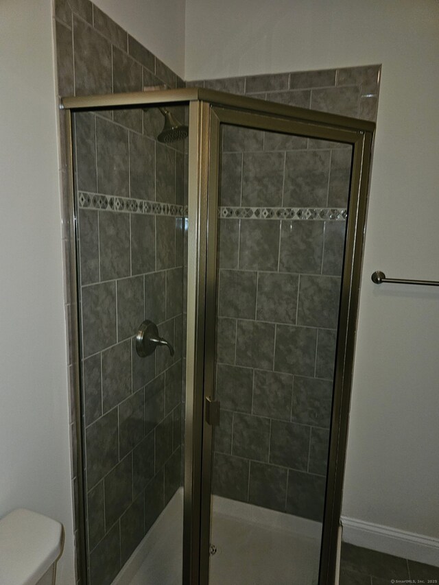 17 Marble Faun Ln Unit 17, Windsor, CT 06095 - full bathroom with toilet, a shower stall, and baseboards