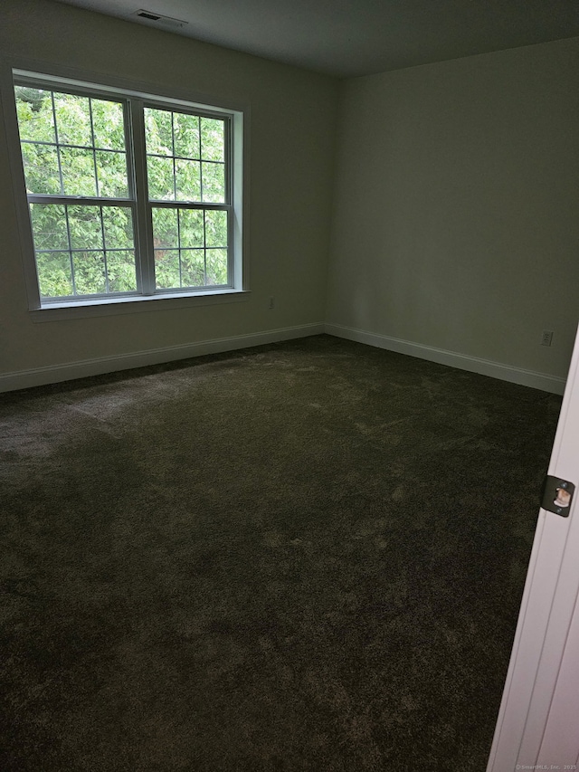 17 Marble Faun Ln Unit 17, Windsor, CT 06095 - spare room featuring dark colored carpet and baseboards