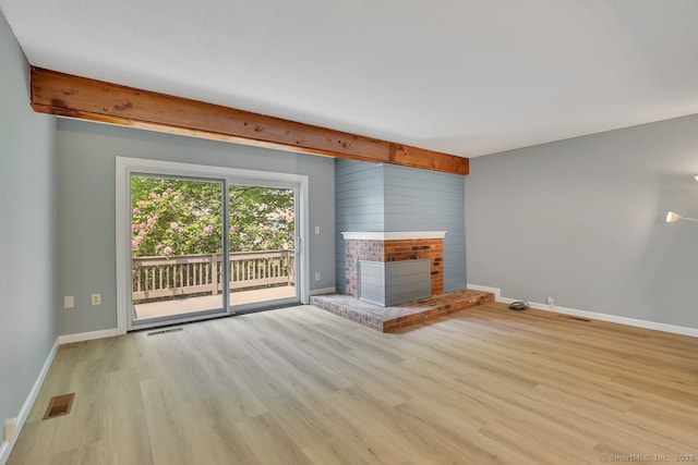 2 Edgehill Ct Unit 2, Woodbury, CT 06798 - unfurnished living room with wood finished floors, baseboards, and a fireplace