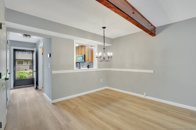 2 Edgehill Ct Unit 2, Woodbury, CT 06798 - unfurnished dining area with light wood-type flooring, a chandelier, beam ceiling, and baseboards