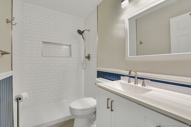 2 Edgehill Ct Unit 2, Woodbury, CT 06798 - full bath with vanity, a tile shower, toilet, and wainscoting