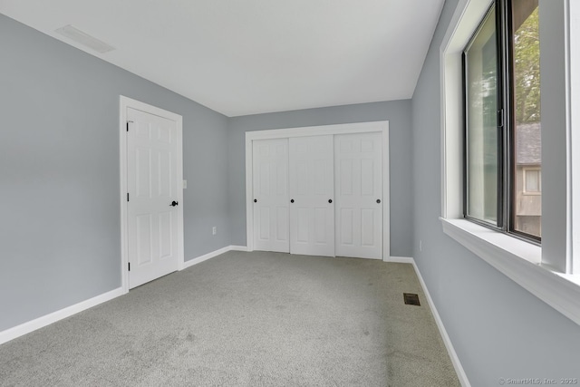 2 Edgehill Ct Unit 2, Woodbury, CT 06798 - unfurnished bedroom featuring carpet, baseboards, and a closet