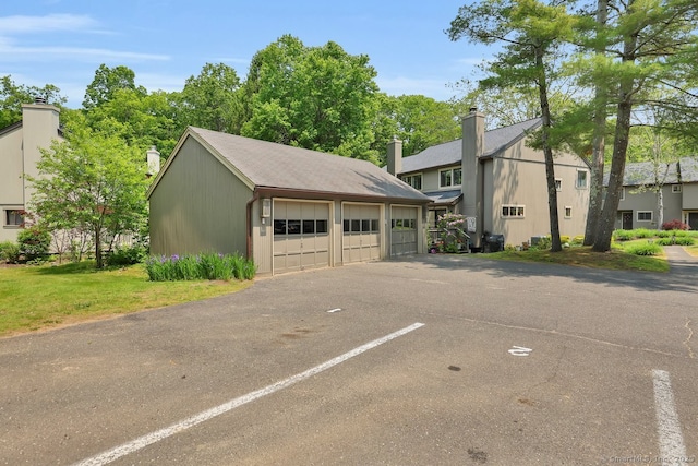 2 Edgehill Ct Unit 2, Woodbury, CT 06798 - view of front of property featuring a chimney and an outdoor structure