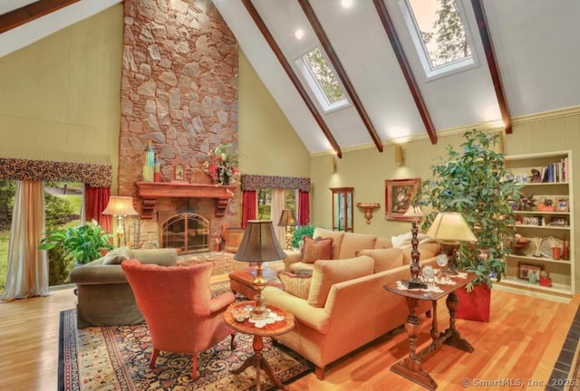 846 Arbutus St, Middletown, CT 06457 - living area featuring high vaulted ceiling, wood finished floors, beamed ceiling, healthy amount of natural light, and a skylight
