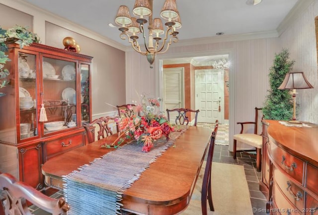 846 Arbutus St, Middletown, CT 06457 - dining space featuring a chandelier, crown molding, and dark tile patterned flooring