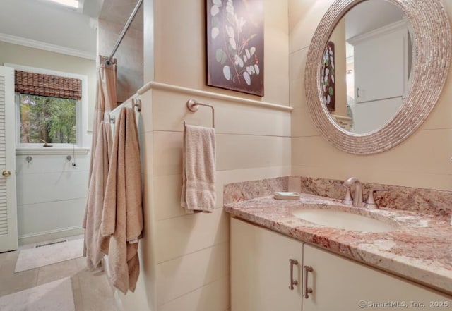 846 Arbutus St, Middletown, CT 06457 - full bath featuring ornamental molding, vanity, a shower, and tile patterned floors