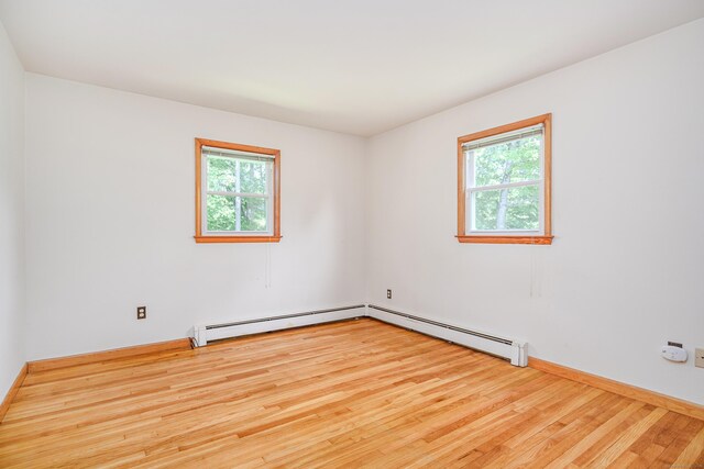 66 Hobby Dr, Ridgefield, CT 06877 - unfurnished room with a baseboard heating unit, wood finished floors, and baseboards