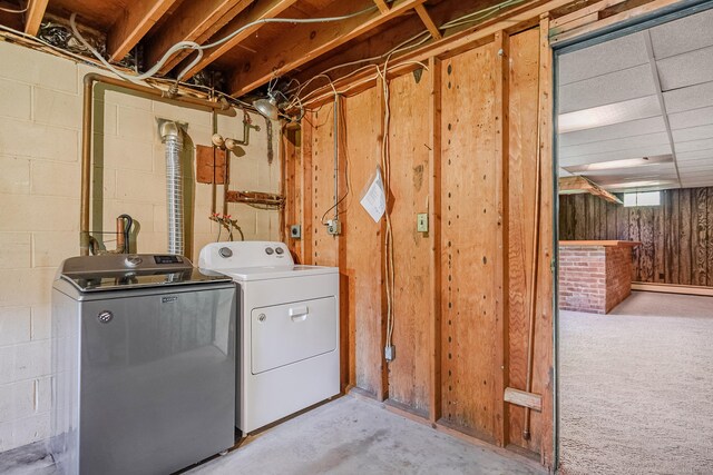 66 Hobby Dr, Ridgefield, CT 06877 - laundry area with baseboard heating, independent washer and dryer, concrete block wall, and wooden walls