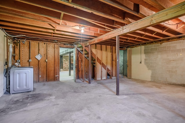 66 Hobby Dr, Ridgefield, CT 06877 - unfinished below grade area with washer / dryer and concrete block wall