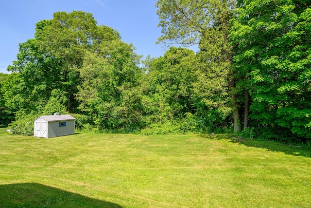 66 Hobby Dr, Ridgefield, CT 06877 - view of grassy yard featuring a wooded view