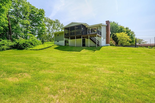 66 Hobby Dr, Ridgefield, CT 06877 - rear view of property with a sunroom, a chimney, a yard, and stairway