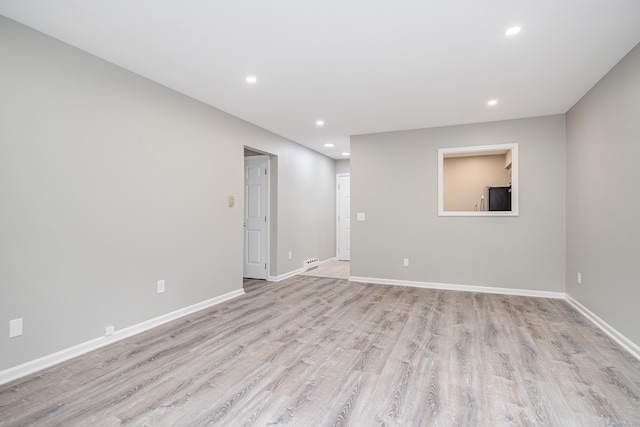 55 Mill Plain Rd Unit 34-14, Danbury, CT 06811 - unfurnished room with recessed lighting, light wood-style floors, and baseboards