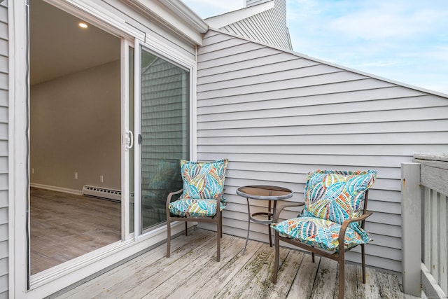 55 Mill Plain Rd Unit 34-14, Danbury, CT 06811 - wooden terrace featuring a baseboard heating unit