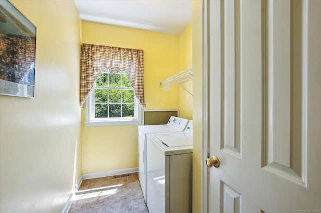 67 Bartman Rd, Haddam, CT 06441 - laundry room with separate washer and dryer, baseboards, and light tile patterned flooring