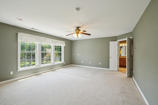 67 Bartman Rd, Haddam, CT 06441 - spare room featuring a smoke detector, light colored carpet, ceiling fan, and baseboards