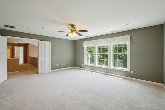 67 Bartman Rd, Haddam, CT 06441 - spare room featuring baseboards, ceiling fan, and light carpet