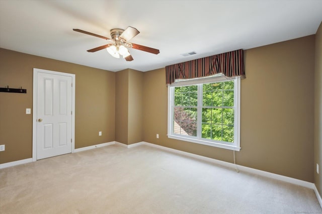 67 Bartman Rd, Haddam, CT 06441 - empty room featuring light colored carpet, a ceiling fan, and baseboards