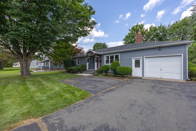 881 Pine St, Bristol, CT 06010 - ranch-style house featuring driveway, an attached garage, a chimney, and a front lawn