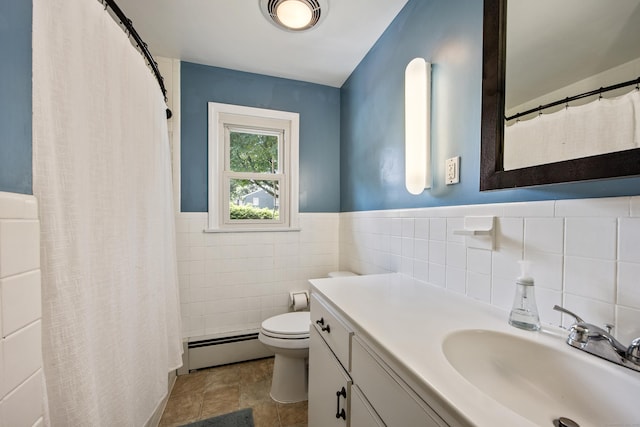 881 Pine St, Bristol, CT 06010 - bathroom featuring a baseboard radiator, tile walls, vanity, a wainscoted wall, and curtained shower