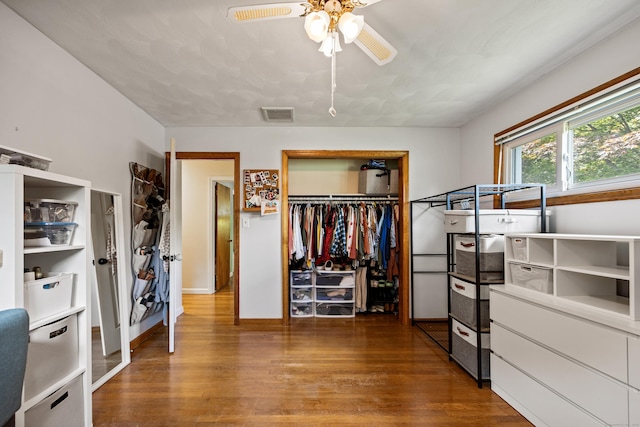 881 Pine St, Bristol, CT 06010 - unfurnished bedroom featuring wood finished floors, a closet, and a ceiling fan