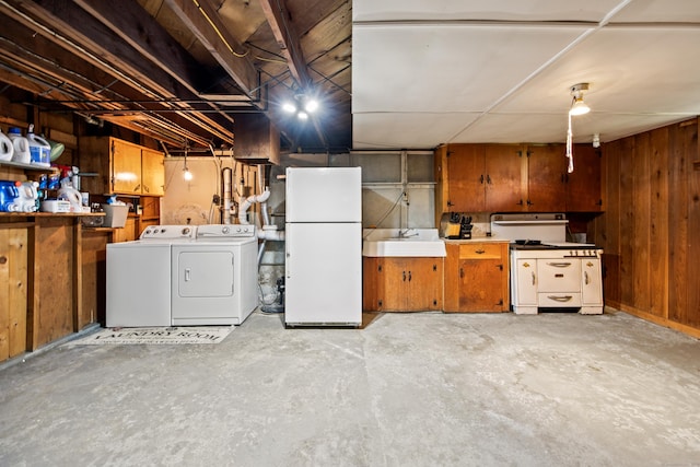 881 Pine St, Bristol, CT 06010 - unfinished basement featuring freestanding refrigerator, separate washer and dryer, and wooden walls