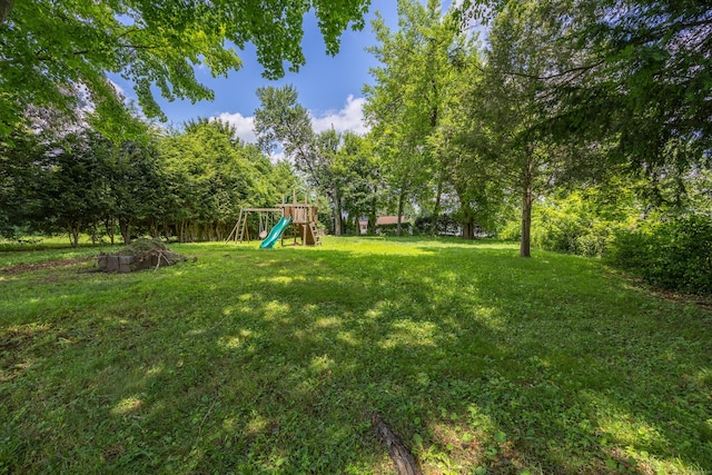 881 Pine St, Bristol, CT 06010 - view of grassy yard featuring a playground