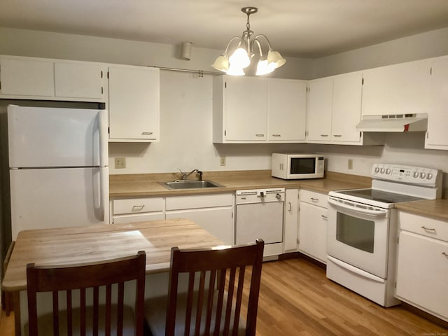 322 N St, Roxbury, CT 06783 - kitchen with white appliances, under cabinet range hood, a sink, white cabinets, and light wood finished floors