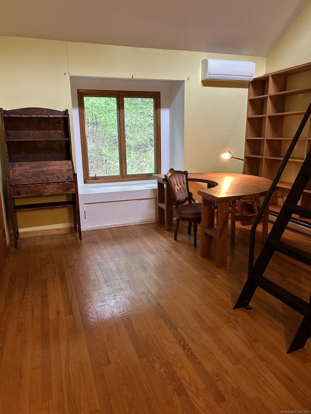 322 N St, Roxbury, CT 06783 - dining space featuring a wall mounted AC and wood finished floors