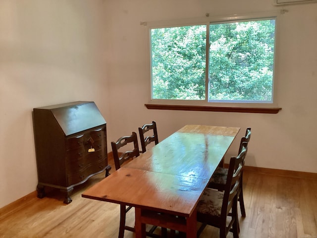 322 N St, Roxbury, CT 06783 - dining room featuring plenty of natural light, wood finished floors, baseboards, and a wall mounted AC