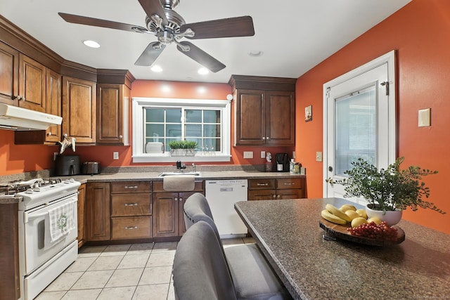567 Bunker Hill Ave, Waterbury, CT 06708 - kitchen featuring white appliances, ceiling fan, under cabinet range hood, light tile patterned floors, and dark countertops
