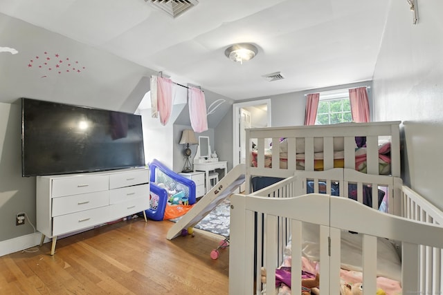 567 Bunker Hill Ave, Waterbury, CT 06708 - bedroom with wood finished floors and vaulted ceiling