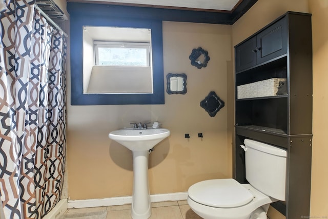 567 Bunker Hill Ave, Waterbury, CT 06708 - bathroom featuring a shower with shower curtain and tile patterned floors