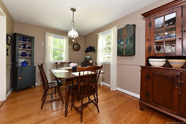 10 Brewer Rd, East Hampton, CT 06424 - dining area featuring light wood-type flooring and baseboards
