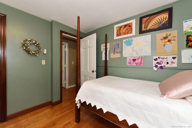 10 Brewer Rd, East Hampton, CT 06424 - bedroom with wood finished floors and baseboards