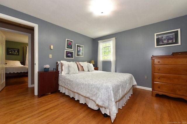 10 Brewer Rd, East Hampton, CT 06424 - bedroom featuring wood finished floors and baseboards