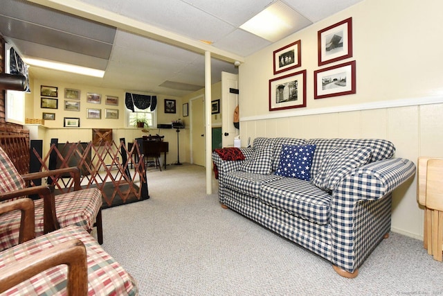 10 Brewer Rd, East Hampton, CT 06424 - carpeted living area featuring a drop ceiling and a wainscoted wall