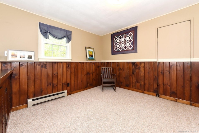 10 Brewer Rd, East Hampton, CT 06424 - living area with a baseboard radiator, carpet, wainscoting, wood walls, and ornamental molding