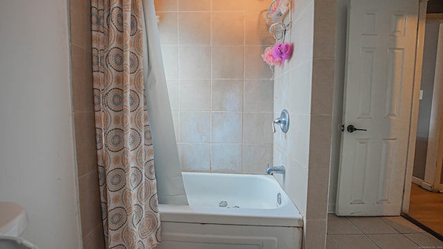 1149 Central Ave, Bridgeport, CT 06607 - full bath featuring tile patterned floors and shower / bath combo with shower curtain