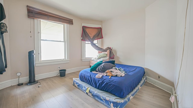 1149 Central Ave, Bridgeport, CT 06607 - bedroom with wood finished floors and baseboards