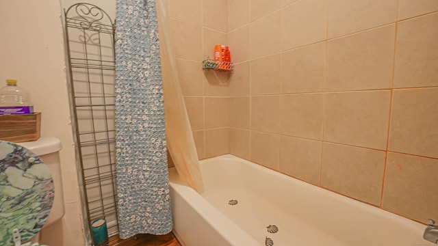 1149 Central Ave, Bridgeport, CT 06607 - bathroom with shower / tub combo with curtain