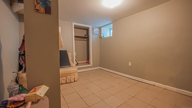 1149 Central Ave, Bridgeport, CT 06607 - below grade area with tile patterned floors and baseboards