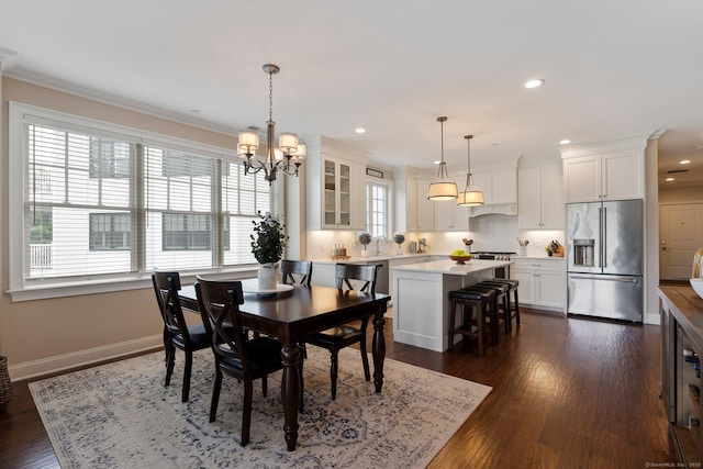 788 Farmington Ave Apt 202, Farmington, CT 06032 - dining room with a chandelier, dark wood finished floors, ornamental molding, baseboards, and recessed lighting