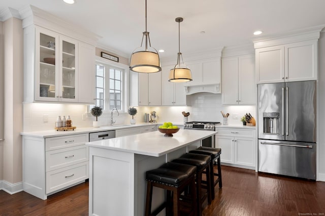 788 Farmington Ave Apt 202, Farmington, CT 06032 - kitchen featuring appliances with stainless steel finishes, dark wood-type flooring, white cabinets, recessed lighting, and crown molding