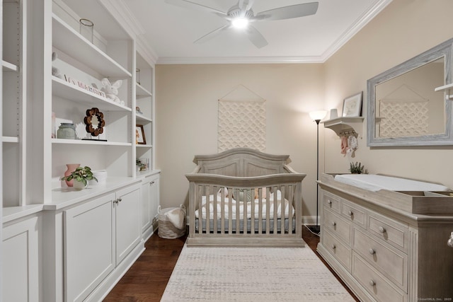 788 Farmington Ave Apt 202, Farmington, CT 06032 - bedroom with ornamental molding, dark wood-style flooring, a crib, and a ceiling fan