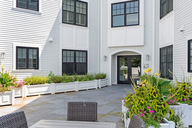 788 Farmington Ave Apt 202, Farmington, CT 06032 - view of exterior entry featuring french doors and a patio